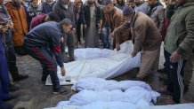 The bodies of victims from overnight Israeli army strikes