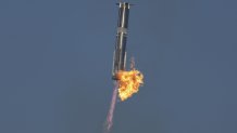 SpaceX's mega rocket Starship booster returns to the launch pad during a test flight from Starbase in Boca Chica, Texas.