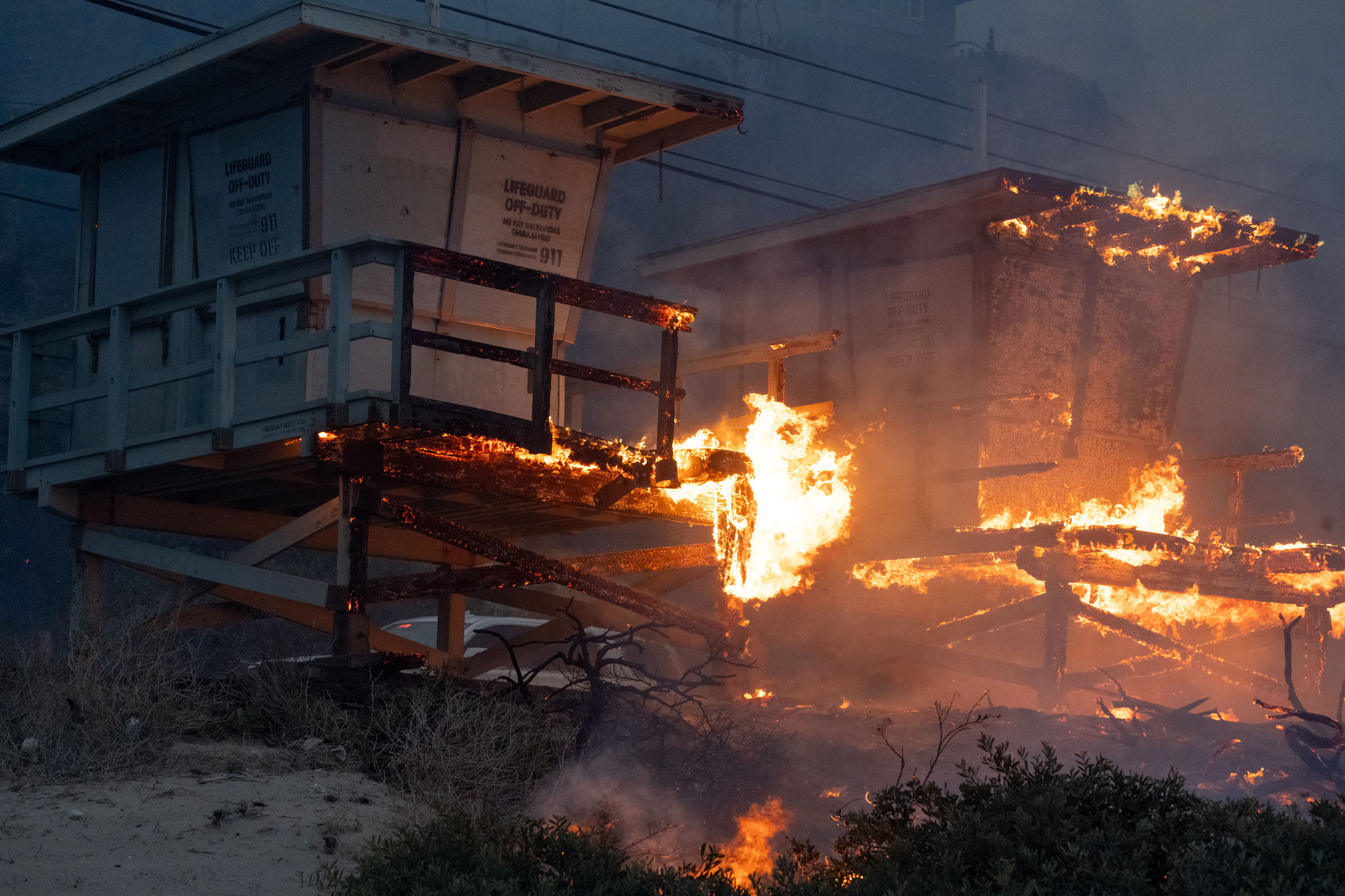 Lifeguard towers go up in flames along Malibu beach in the Palisades Fire on Tuesday, January 7, 2025 (Photo by David Crane/MediaNews Group/Los Angeles Daily News via Getty Images)