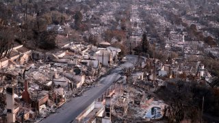 Pacific Palisades, California January 15, 2025- Rows of houses are turned to rubble after the Palisades Fire torched Pacific Palisades. (Wally Skalij/Los Angeles Times via Getty Images)