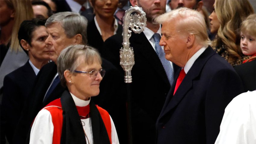 Bishop Mariann Edgar Budde (L) arrives as U.S. President Donald Trump looks on during the National Prayer Service at Washington National Cathedral on Jan. 21, 2025 in Washington, D.C.