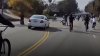 Video shows Mercedes Benz weaving past large group  riding bicycles in Mid-Wilshire