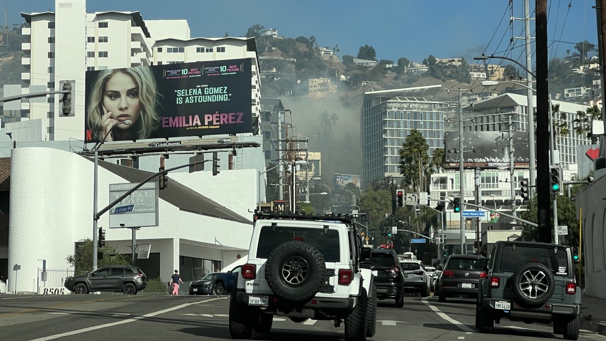 Hollywood Hills brush fire threatens buildings on day of red flag warnings