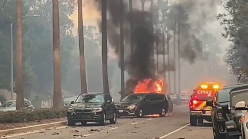 A car burns during the Pacific Palisades fire on Jan. 7, 2025.