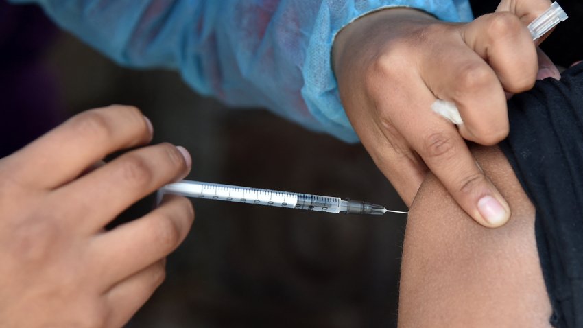 A boy getting vaccinated