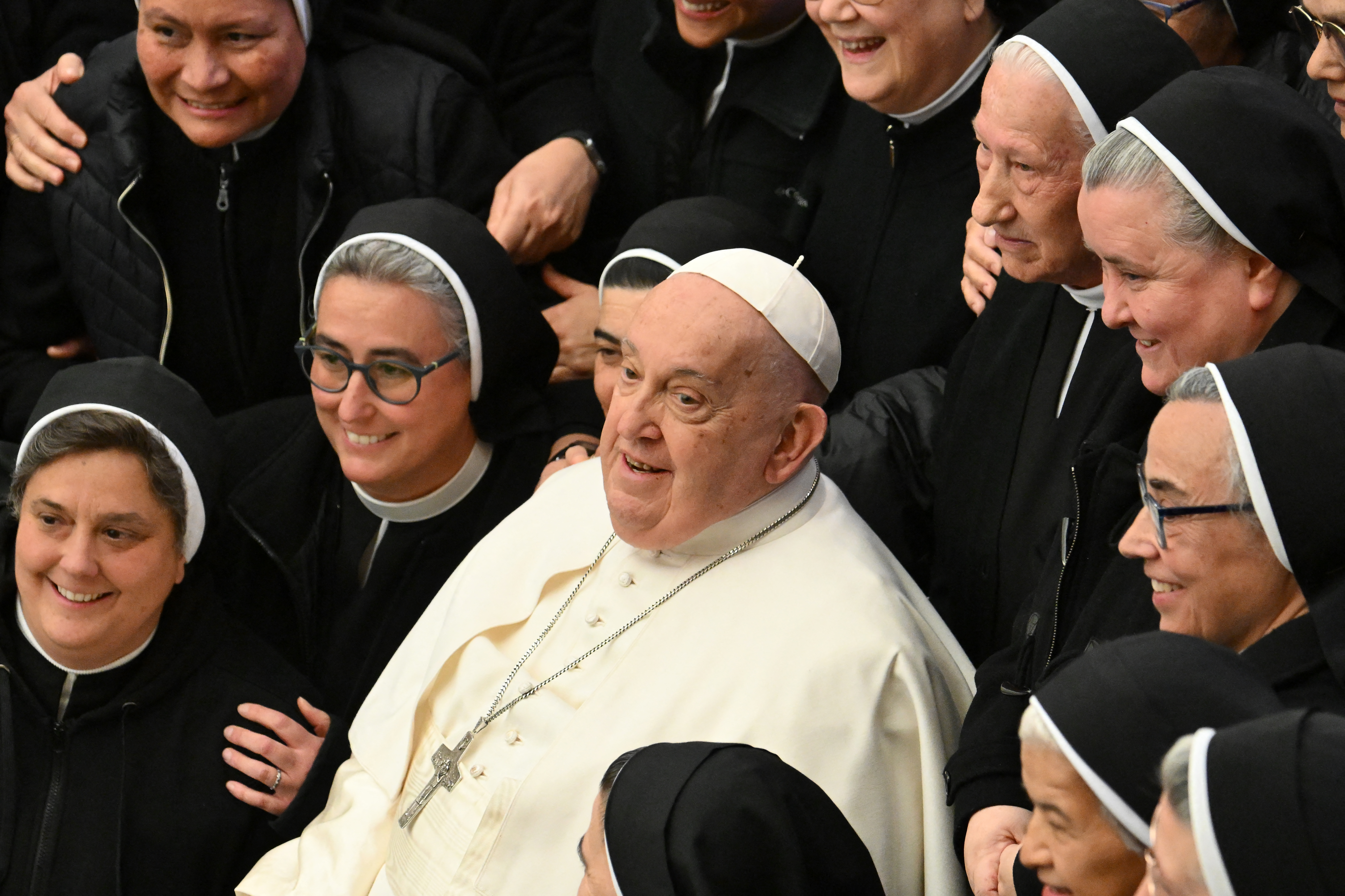 Pope Francis poses with nuns at the end of a weekly general audience at Paul-VI hall in The Vatican on Feb. 5, 2025.
