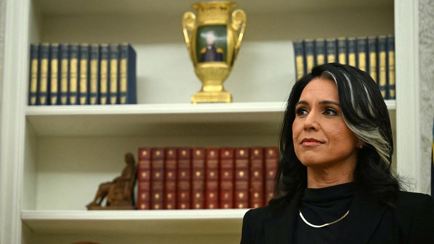 Tulsi Gabbard waits to be sworn in as Director of National Intelligence (DNI) in the Oval Office of the White House on Feb. 12, 2025.