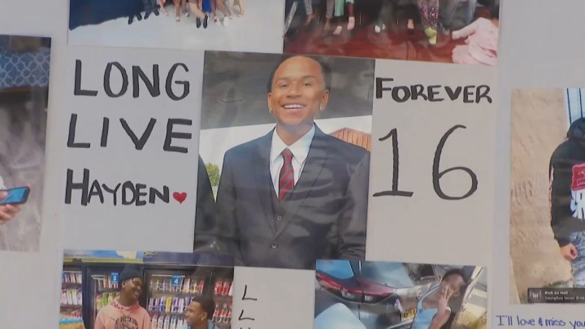 A sign commemorates the life of 16-year-old Hayden Neighbors, who was killed by a hit-and-run driver in South Los Angeles on Sunday, Feb. 24, 2025.