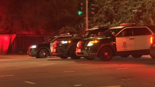 Police investigate a deadly shooting at a Woodland Hills house party on Sunday, Feb. 9, 2025.
