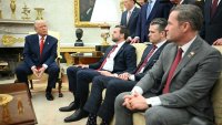 US President Donald Trump speaks to the press as he meets with NATO Secretary General Mark Rutte in the Oval Office of the White House in Washington, DC, on March 13, 2025 as, seated from L to R, Vice Presient JD Vance, Defense Secretary Pete Hegseth and National Security Advisor Mike Waltz.
