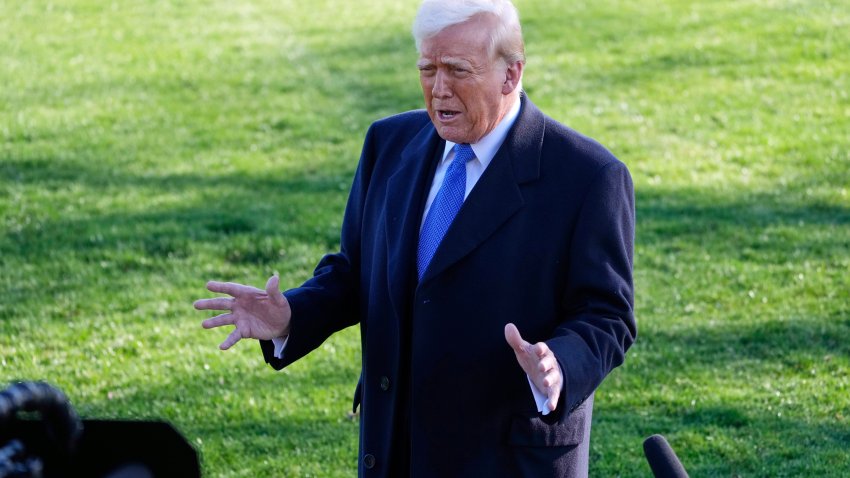 President Donald Trump speaks with reporters before departing on Marine One en route to New Jersey, Friday, Mar. 21, 2025, in Washington.