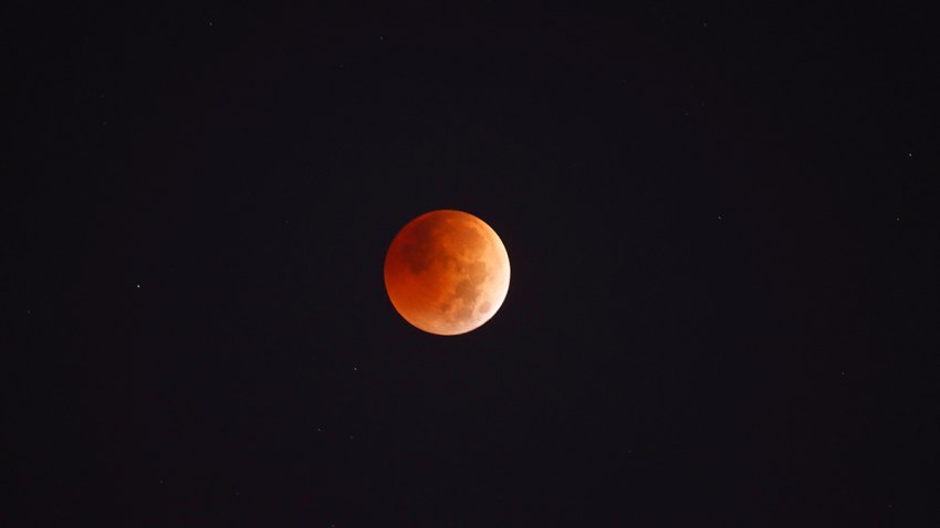 FILE - A blood-red moon is seen during a total lunar eclipse on Nov. 8, 2022, in New York City.