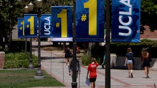 WESTWOOD, CA – AUGUST 15, 2024 – Students and visitors make their way on the UCLA campus in Westwood on August 15, 2024. (Genaro Molina/Los Angeles Times via Getty Images)
