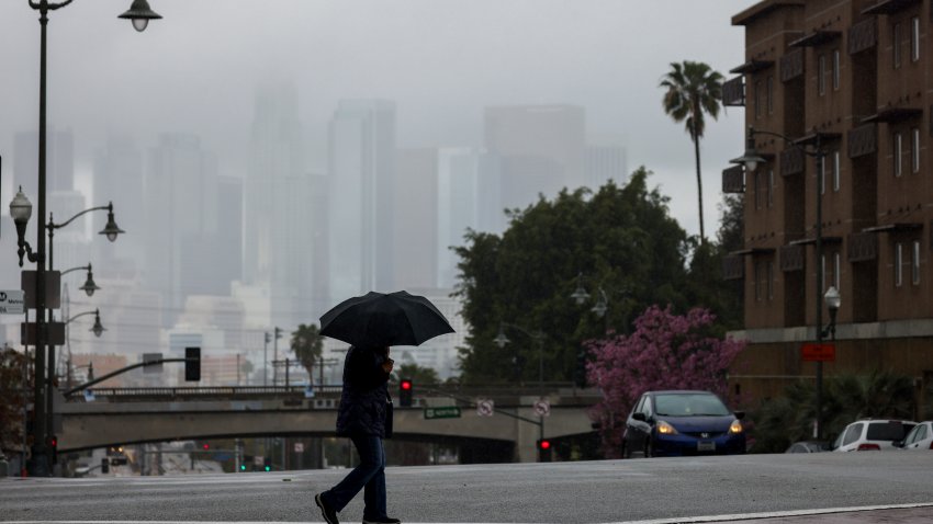 Rain falls over a stormy skyline on Wednesday, March 12, 2025 in Boyle Heights.