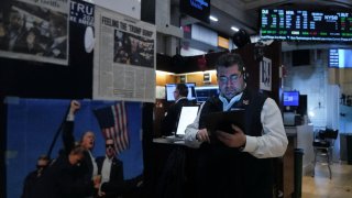 Traders work on the floor at the New York Stock Exchange (NYSE) in New York City, U.S., April 10, 2025.