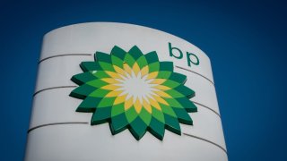 The BP logo is displayed outside a petrol station that also offers electric vehicle recharging, on Feb. 27, 2025, in Somerset, England.