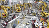 Smart robotic arms work on the production line at the production workshop of Changqing Auto Parts Co., LTD., located in Anqing Economic Development Zone, Anhui Province, China, on March 13, 2025. (Photo by Costfoto/NurPhoto via Getty Images)