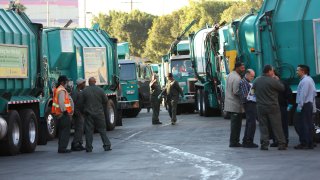 LOS ANGELES, CA FEBRUARY 10, 2015 — Refuse collection operators prepare to leave the LA City Sanitation Yard Thursday morning, February 10, 2015, after a short rally to call for an end to cuts to jobs and services. (Photo by Al Seib/Los Angeles Times via Getty Images)