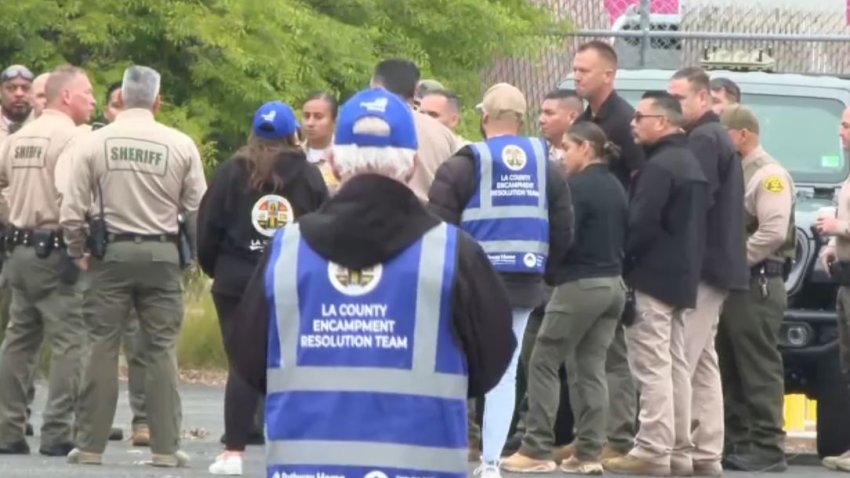 Los Angeles County agencies and nonprofit group members prepare for a homeless encampment outreach operation in the Gardena area Wednesday April 30, 2025.