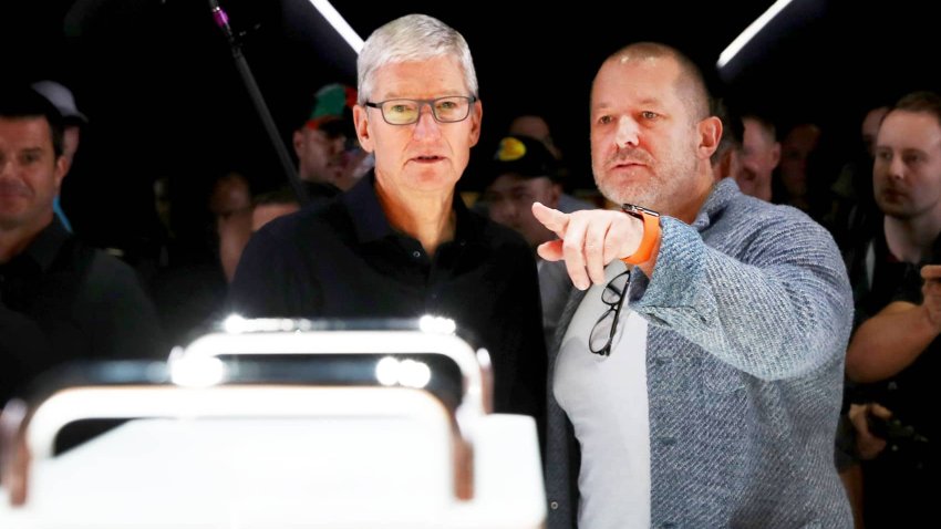 Apple CEO Tim Cook (L) and Apple chief design officer Jony Ive (R) look at the new Mac Pro during the 2019 Apple Worldwide Developer Conference (WWDC) at the San Jose Convention Center on June 03, 2019 in San Jose, California.