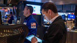 Traders work on the New York Stock Exchange  floor on April 28, 2025 in New York City.