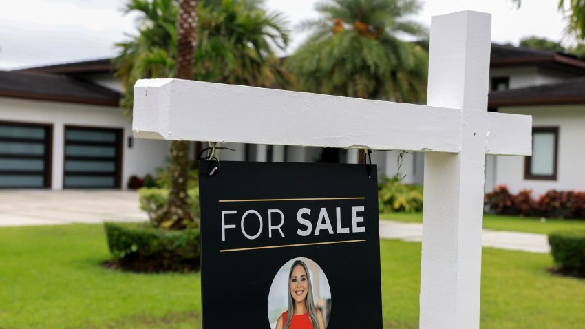 A For Sale sign sits in front of a home on May 12, 2025 in Miami, Florida.
