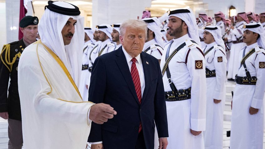 Qatar’s Emir Sheikh Tamim bin Hamad al-Thani (L) receives US President Donald Trump in the Qatari capital Doha on May 14, 2025.