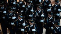 Members of the military stand as US President Donald Trump reviews the troops in Emancipation Hall during inauguration ceremonies at the US Capitol in Washington, on January 20, 2025.