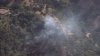 Crews battle brush fire in Studio City