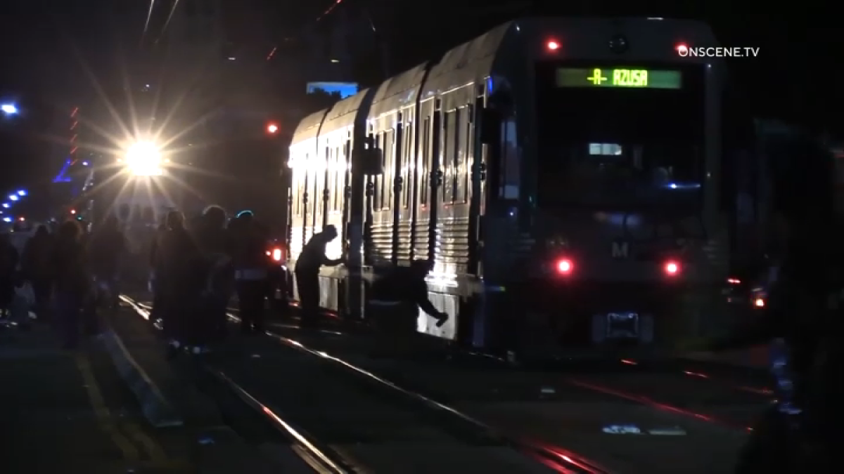 Businesses, Metro trains vandalized as mob wreaks havoc in downtown LA – NBC Los Angeles