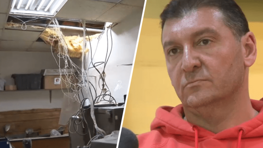 Manail Bidrussian is pictured alongside a ceiling that thieves cut through to break into his Glendale jewelry store.