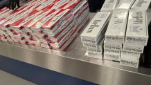 Hundreds of cartons of contraband cigarettes were seized from two passengers arriving April 17 in Southern California on a cruise ship.