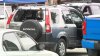 Woman shot and killed while driving SUV in Orange neighborhood