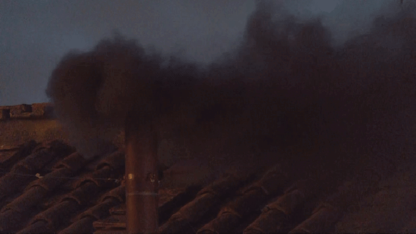 Smoke billowing from Sistine Chapel