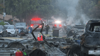 San Diego neighborhood evacuated after small plane crashes into military homes