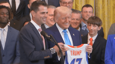 NCAA champions Florida Gators give Trump a ‘47' jersey during White House visit