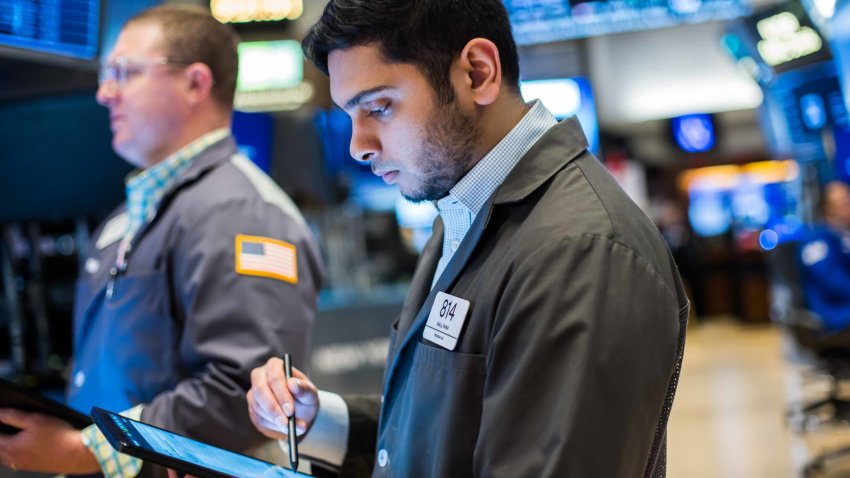 Traders work at the New York Stock Exchange on May 9, 2025.