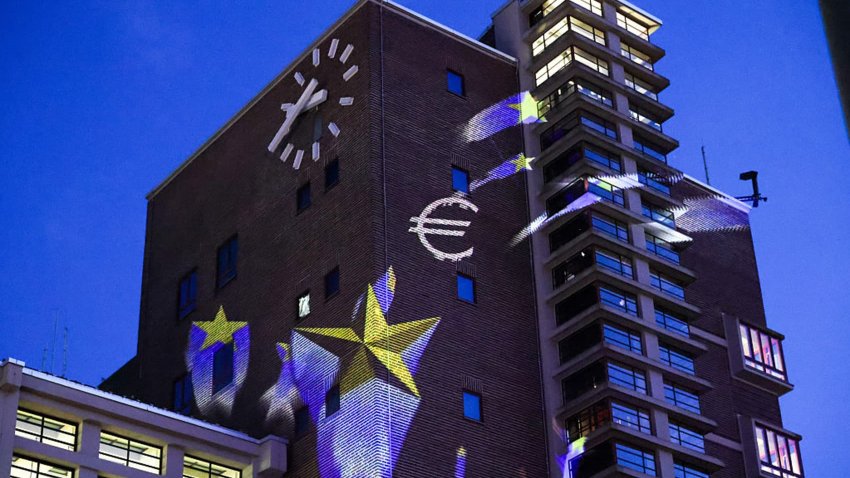 A projected illumination marking the 75th anniversary of the Schuman Declaration, on the Grossmarkthalle building at the European Central Bank headquarters in Frankfurt, Germany, on May 9, 2025.