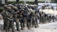 U.S. Border Patrol and protesters clash after a raid was conducted by Immigration and Customs Enforcement near a Home Depot of illegal immigrants in Paramount, California on June 06, 2025.