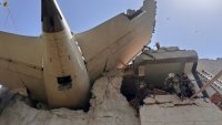 A view shows the rear of an Air India plane following its crash, in Ahmedabad, India, June 12, 2025.