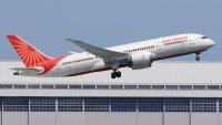 Air India Boeing 787 Dreamliner aircraft with registration letters VT-ANB flies over Tokyo, Japan, April 27, 2025 in this picture obtained from social media.