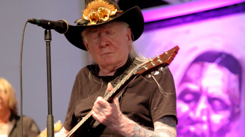 FILE - Johnny Winter performs at the 2014 New Orleans Jazz & Heritage Festival at Fair Grounds Race Course, May 3, 2014, in New Orleans.