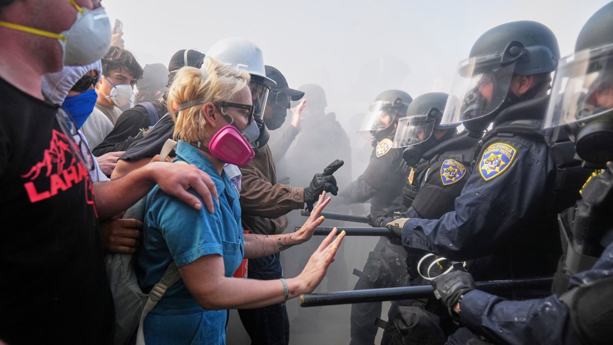 Debate over protest masks raises First Amendment questions – NBC Los ...