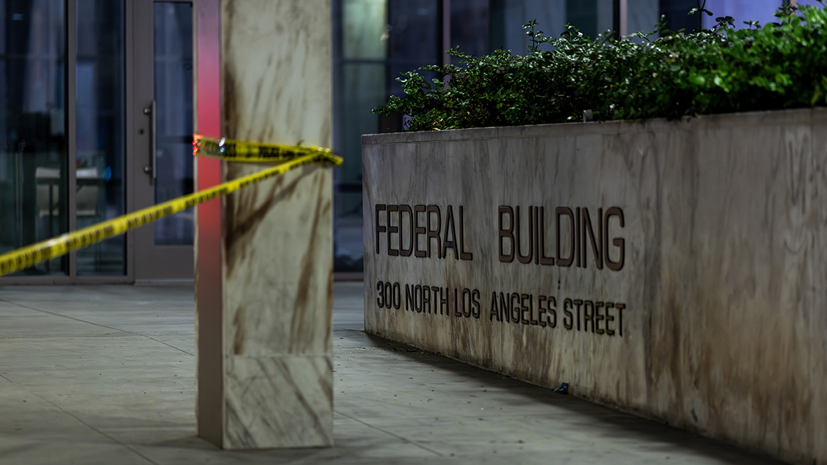 FBI agents were investigating an apparent attempted firebombing at a federal building in Downtown Los Angeles, and its possible connection to an arson fire...