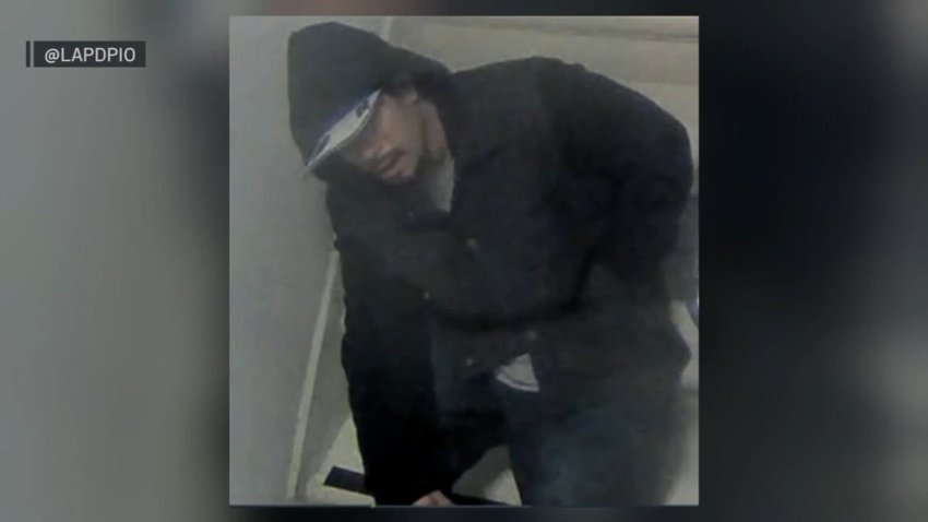 Still image provided by the LAPD shows a man they say was prowling inside a Valley Village apartment complex when a resident was murdered.