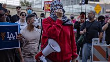 Los Angeles, CA - June 06: Demonstrators protest outside the Edward R. Roybal Federal Building and the Metropolitan Detention Center in response to ICE raids in Los Angeles on Friday, June 6, 2025 in Los Angeles, CA. (Jason Armond / Los Angeles Times via Getty Images)