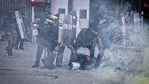 Los Angeles, CA - June 06: DHS police arrest at demonstrator during a protest outside the Metropolitan Detention Center in response to ICE raids in Los Angeles on Friday, June 6, 2025 in Los Angeles, CA. (Jason Armond / Los Angeles Times via Getty Images)