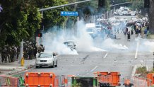 Paramount, CA - June 07: in NParamount - People block off the street and set a fire during protests against ICE and immigration raids on Saturday, June 7, 2025 in Paramount, CA. (Myung J. Chun / Los Angeles Times via Getty Images)