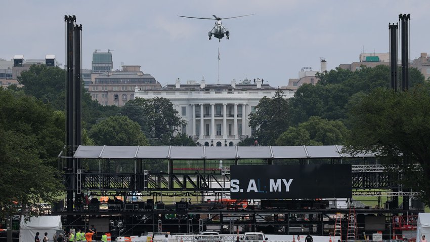 June 9, 2025: Marine One lands at the White House as workers put up a riser ahead of the Army’s 250th birthday parade and celebration.