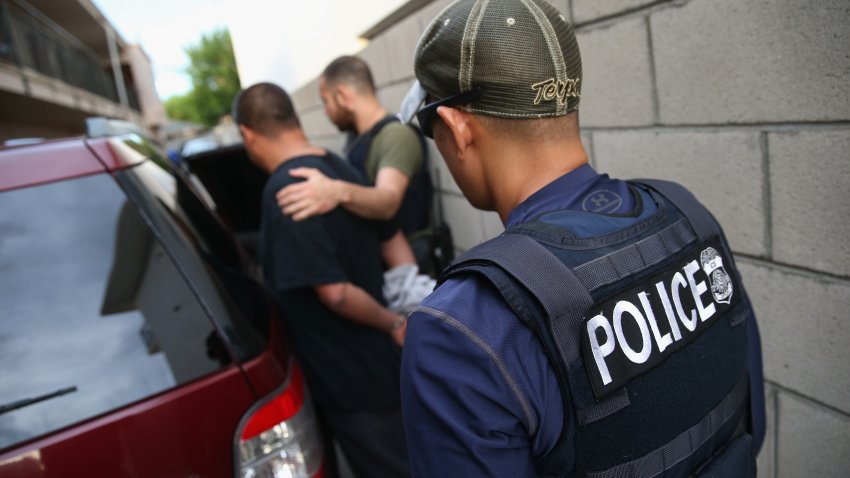 LOS ANGELES, CA – OCTOBER 14:  A man is detained by U.S. Immigration and Customs Enforcement (ICE), agents on October 14, 2015 in Los Angeles, California. ICE agents said the immigrant, holding a Green Card, was a convicted criminal and member of the Alabama Street Gang. ICE builds deportation cases against thousands of immigrants living in the United States. Green Card holders are also vulnerable to deportation if convicted of certain crimes. The number of ICE detentions and deportations from California has dropped since the state passed the Trust Act in October 2013, which set limits on California state law enforcement cooperation with federal immigration authorities.  (Photo by John Moore/Getty Images)